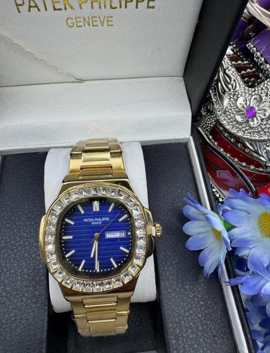 Patek Philippe Nautilus – Rose Gold Baguette Diamond Bezel Blue Dial